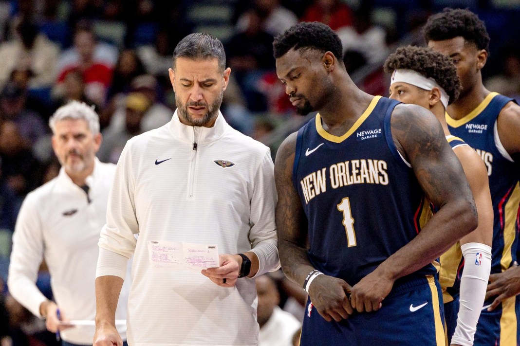 Pelicans head coach James Borrego talks to Zion Williamson in a meeting with the Nuggets during the 2025-26 NBA season.