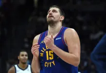 NBA Picks & Predictions Today (Nov. 24): Best Bets on Sides & Totals Nuggets superstar NIkola Jokic reacts to a play against the Kings during the 2025-26 NBA season.