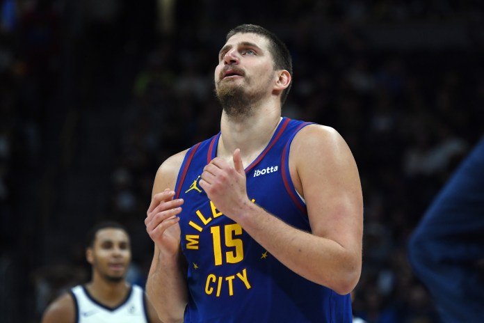 Nuggets superstar NIkola Jokic reacts to a play against the Kings during the 2025-26 NBA season.