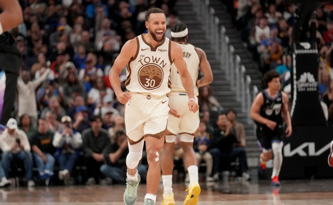 Warriors star Stephen Curry celebrates a big play against the Jazz during the 2025-26 NBA season.