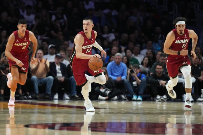 Heat star Tyler Herro brings the ball up the floor against the Mavericks during the 2025-26 NBA season.