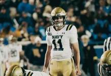 Navy vs. Cincinnati Liberty Bowl Prediction January 2, 2026 Navy quarterback Blake Horvath gets ready to snap the ball against Memphis during the 2025 college football season.