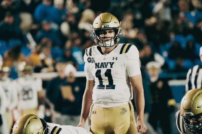 Navy quarterback Blake Horvath gets ready to snap the ball against Memphis during the 2025 college football season.