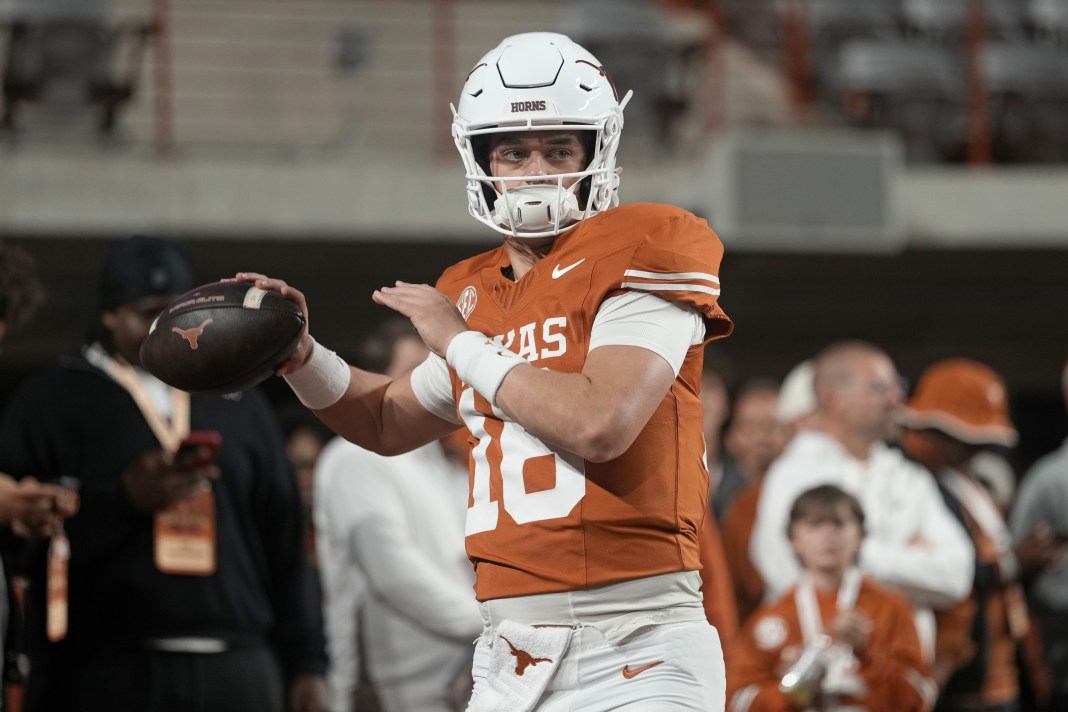 Texas quarterback Arch Manning warms up for a game against Texas A&M during the 2025 college football season.