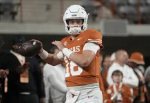 Michigan vs. Texas Citrus Bowl Prediction December 31, 2025 Texas quarterback Arch Manning warms up for a game against Texas A&M during the 2025 college football season.