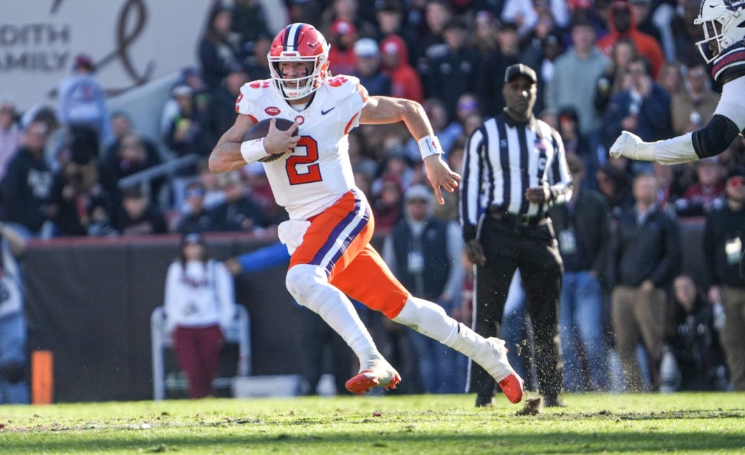 Clemson star Cade Klubnik runs against South Carolina during the 2025 college football season.