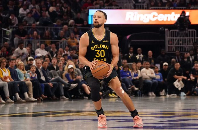 Warriors star Stephen Curry takes a jumper against the Rockets during the 2025-26 NBA season.