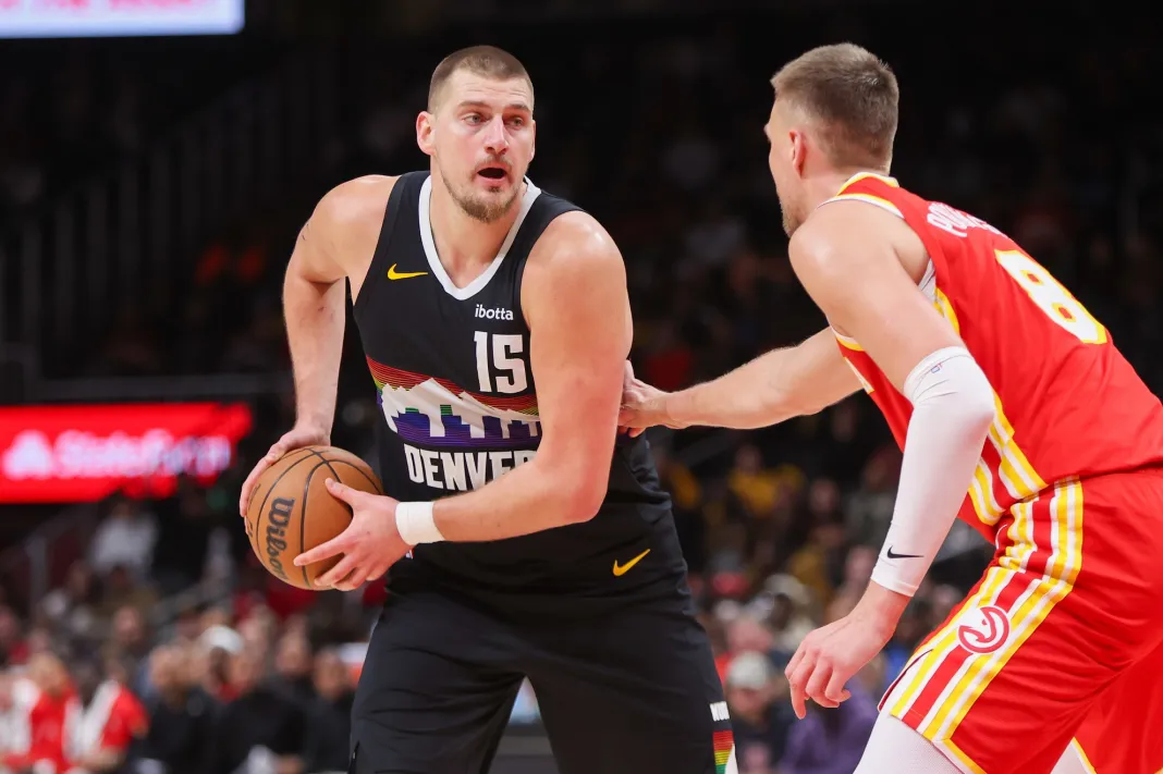 NBA: Denver Nuggets at Atlanta Hawks Nuggets star Nikola Jokic looks to make a play against the Hawks during the 2025-26 NBA season.