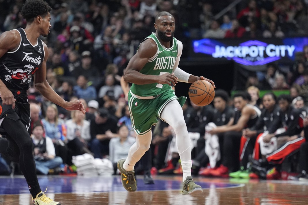 Celtics superstar Jaylen Brown brings the ball up against the Raptors during the 2025-26 NBA season.