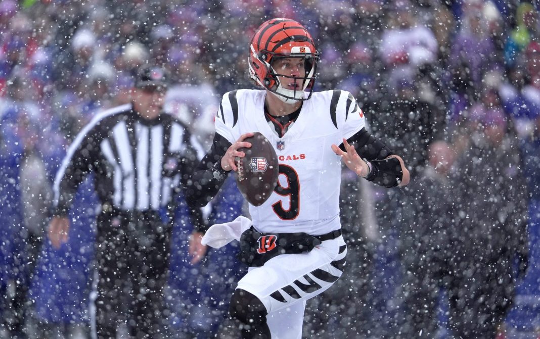 Syndication: Democrat and Chronicle Bengals star Joe Burrow looks to make a play against the Bills during the 2025 NFL season.