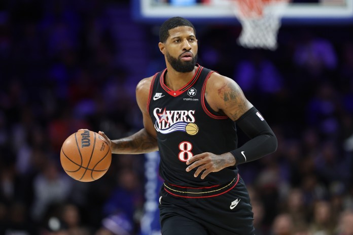 Sixers forward Paul George brings the ball up against the Pacers during the 2025-26 NBA season.