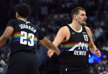 Timberwolves vs. Nuggets Predictions: Christmas Day NBA odds, picks and player props Nuggets superstar Nikola Jokic high fives Cam Johnson in a game against the Rockets during the 2025-26 NBA season.