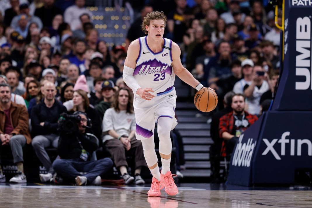 Jazz star Lauri Markkanen brings the ball up against the Nuggets during the 2025-26 NBA season.