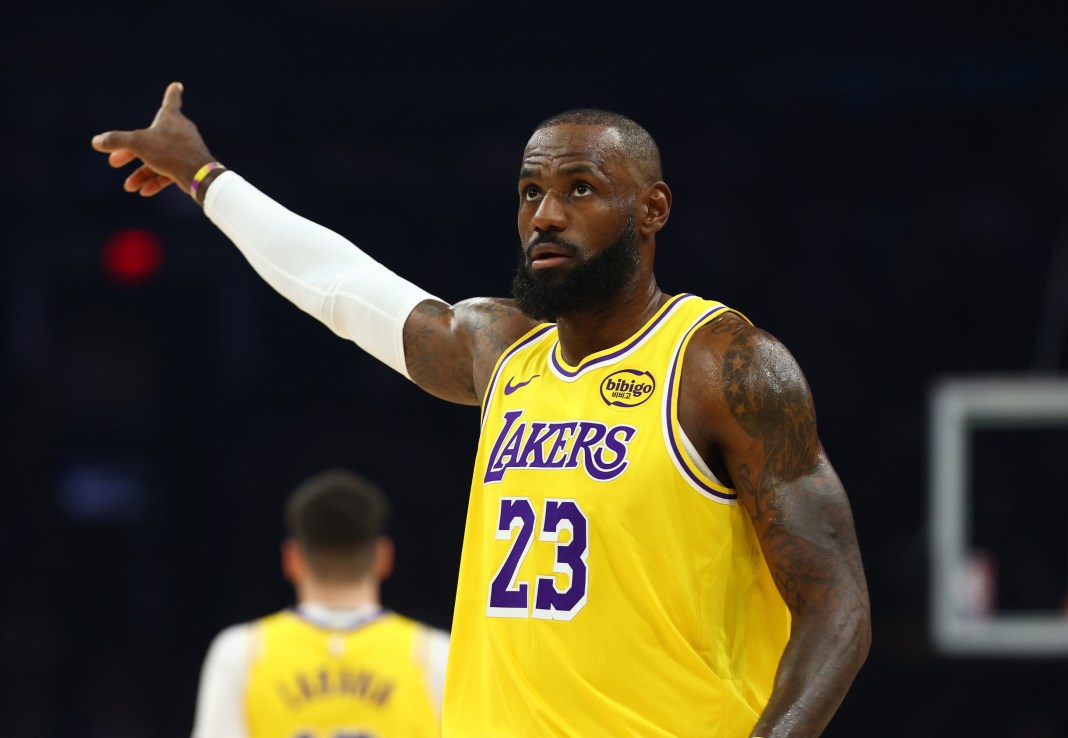 Lakers superstar LeBron James points during a game against the Suns in the 2025-26 NBA season.