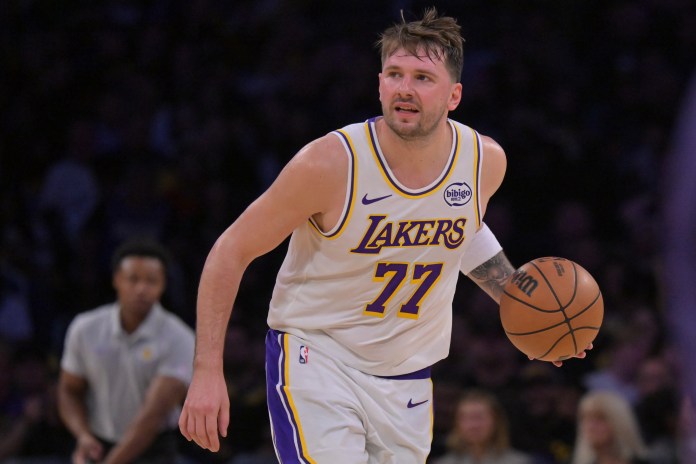 Lakers star Luka Doncic brings the ball up against the Kings during the 2025-26 NBA season.