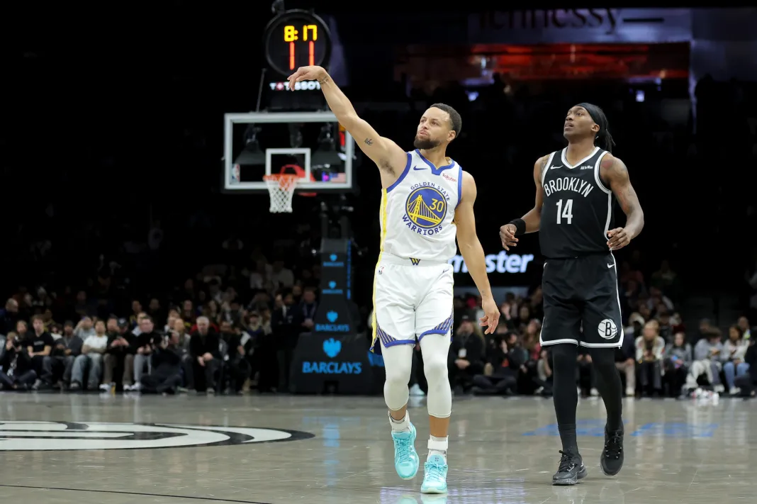 NBA: Golden State Warriors at Brooklyn Nets Warriors star Stephen Curry admires a shot against the Nets during the 2025-26 NBA season.