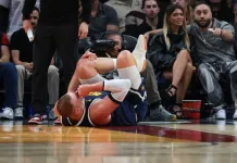 Nikola Jokic Knee Injury Shakes Up NBA Betting Markets: MVP Odds Take a Hit Nuggets superstar Nikola Jokic goes down with a knee injury against the Heat during the 2025-26 NBA season.