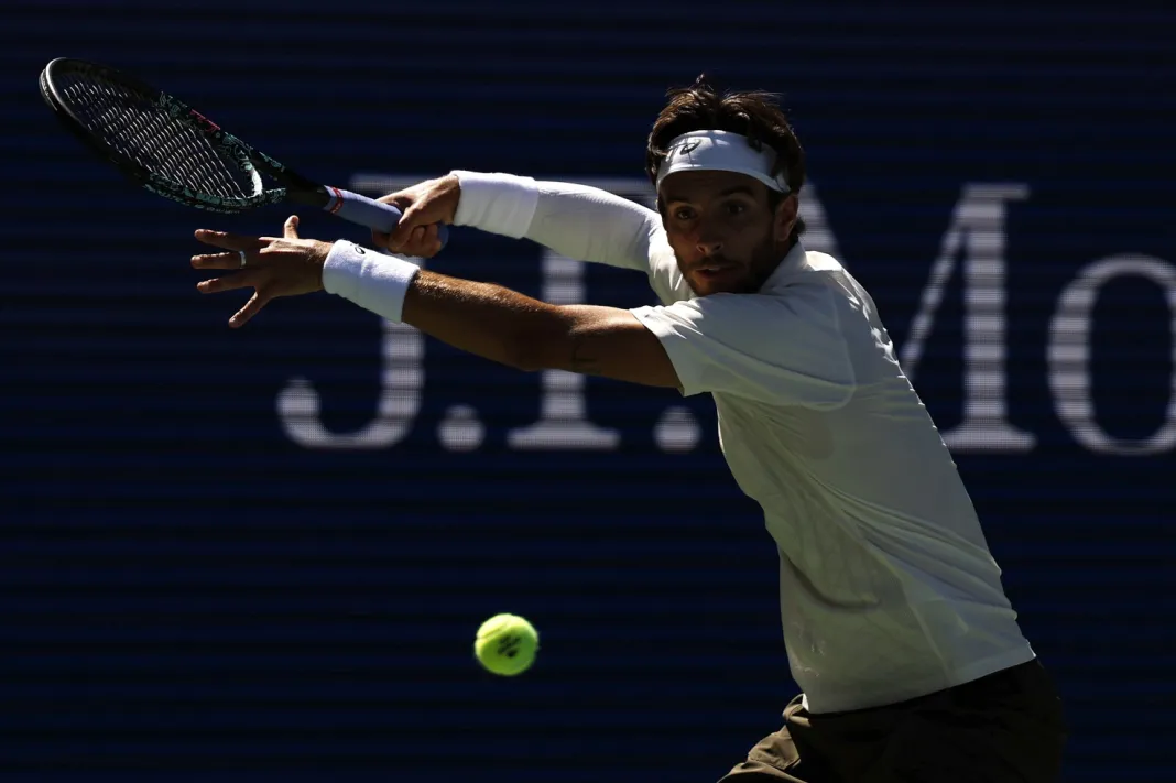 Tennis: US Open Lorenzo Musetti hits a backhand against Giovanni Mpetshi Perricard at the 2025 US Open.