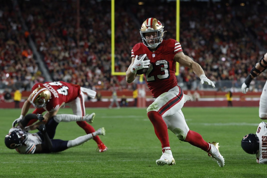 49ers superstar Christian McCaffrey rushes against the Bears during the 2025 NFL season.