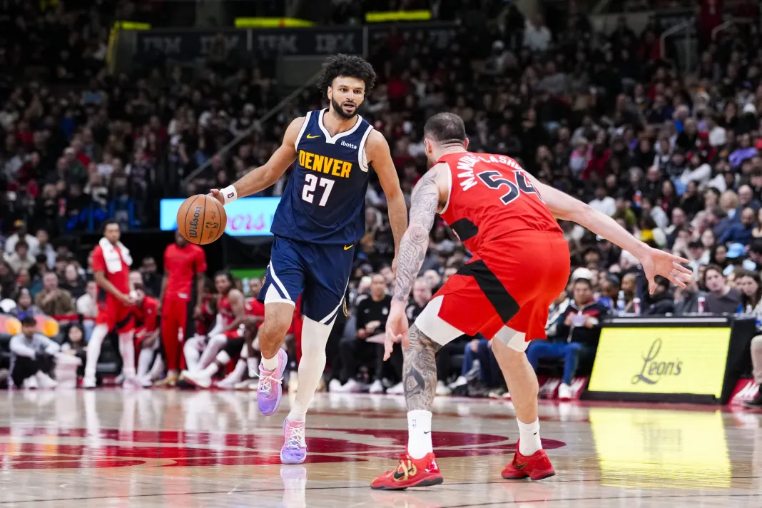 NBA: Denver Nuggets at Toronto Raptors Nuggets star Jamal Murray looks to drive against the Raptors during the 2025-26 NBA season.