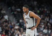 NBA Player Prop Picks Today: Top Prop Bets for Wednesday, January 7 Spurs star De'Aaron Fox looks on against the Blazers during the 2025-26 NBA season.