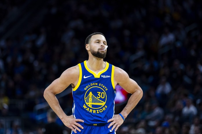 Warriors superstar Stephen Curry reacts to a play against the Jazz during the 2025-26 NBA season.