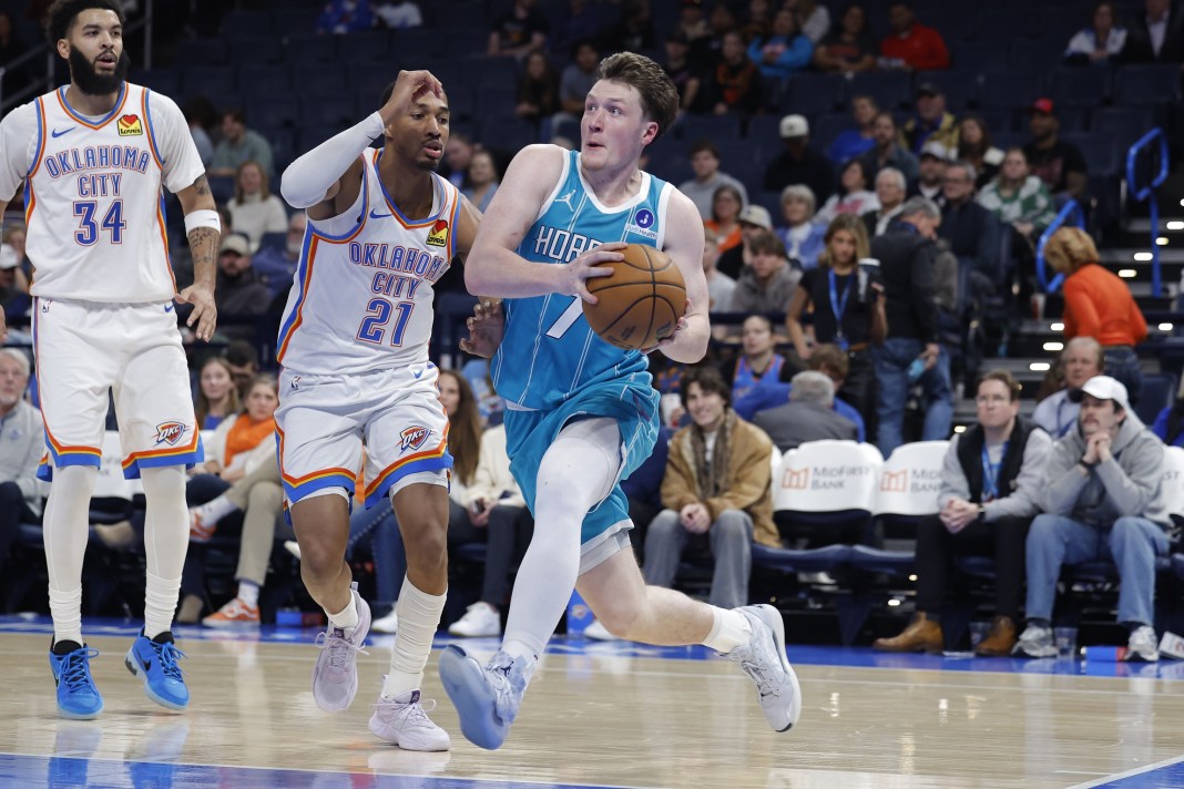 Hornets guard Kon Knueppel drives to the rim against the Thunder during the 2025-26 NBA season.