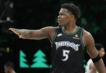 NBA Picks & Predictions Today (Jan. 12): Best Bets on Sides & Totals Timberwolves star Anthony Edwards reacts to a play against the Heat during the 2025-26 NBA season.