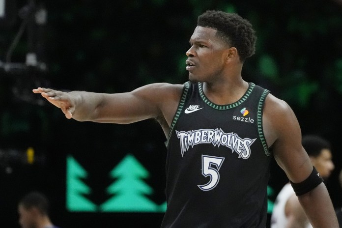 Timberwolves star Anthony Edwards reacts to a play against the Heat during the 2025-26 NBA season.
