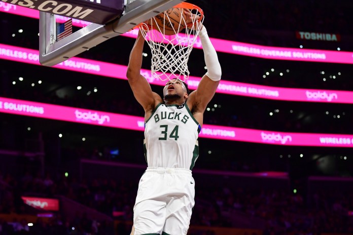 Bucks superstar Giannis Antetokounmpo dunks against the Lakers during the 2025-26 NBA season.