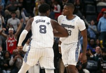 NBA Predictions Today: Best Bets and Player Props for Sunday, January 25 Grizzlies players Jaren Jackson Jr. and Cedric Coward react to a play against the Nets during the 2025-26 NBA season.