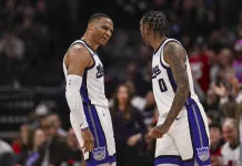 NBA Player Prop Picks Today: Top Prop Bets for Wednesday, January 14 Kings guards Russell Westbrook and Malik Monk react to a play against the Rockets during the 2025-26 NBA season.