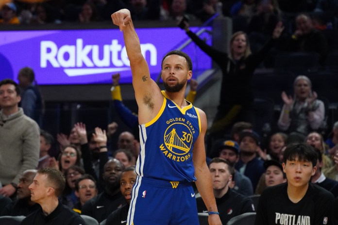 Warriors superstar Stephen Curry holds his release after a shot against the Trail Blazers during the 2025-26 NBA season.