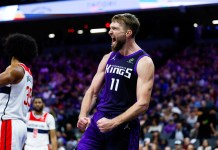 NBA Predictions Today: Best Bets and Player Props for Sunday, January 18 Kings big man Domantas Sabonis flexes against the Wizards during the 2025-26 NBA season.