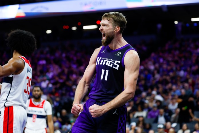 Kings big man Domantas Sabonis flexes against the Wizards during the 2025-26 NBA season.