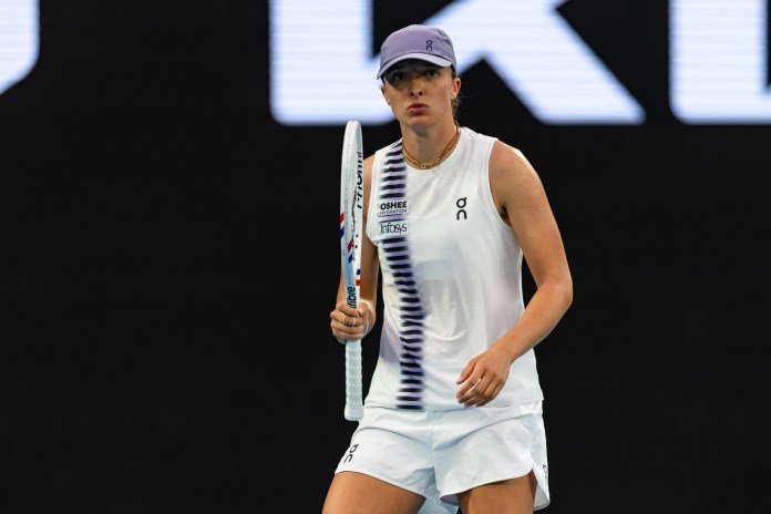 Iga Swiatek reacts to a point won at the 2026 Australian Open.