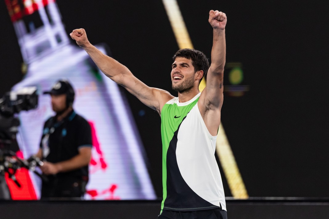 Carlos Alcaraz celebrates a win over Alex de MInaur at the 2026 Australian Open.