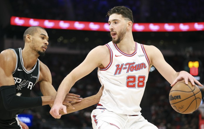 Rockets star Alperen Sengun looks to score against Victor Wembanyama during the 2025-26 NBA season.