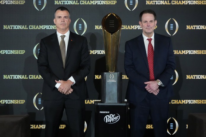 Miami Hurricanes coach Mario Cristobal (left) and Indiana Hoosiers coach Curt Cignetti