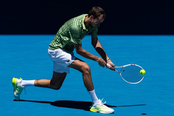 Daniil Medvedev hits a backhand against Fabian Marozsan at the 2026 Australian Open.