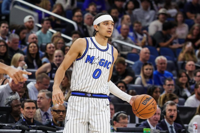 Magic guard Anthony Black surveys the floor against the Cavaliers during the 2025-26 NBA season.