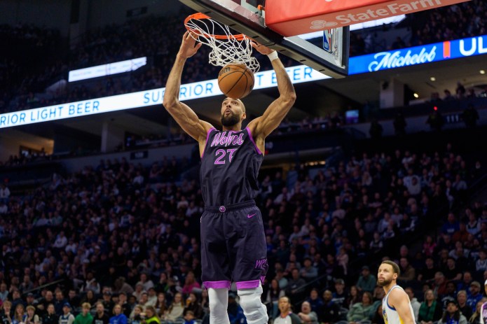 Timberwolves center Rudy Gobert dunks against the Warriors during the 2025-26 NBA season.