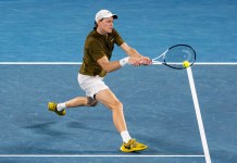 Tennis Best Bets: Picks and predictions for Thursday, February 19 Jannik Sinner hits a backhand against Novak Djokovic at the 2026 Australian Open.