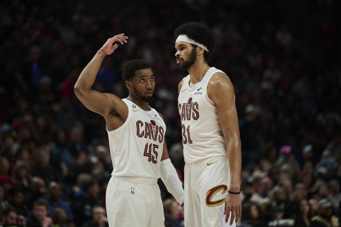 Cavs superstar Donovan Mitchell talks to Jarrett Allen in a meeting with the Blazers during the 2025-26 NBA season.