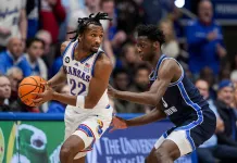 2026 NBA Draft Betting: Dybantsa is too safe to slide past No. 1 despite Peterson’s upside and Boozer’s brilliance Jayhawks star Darryn Peterson is defended by BYU star AJ Dybantsa during the 2025-26 college basketball season.