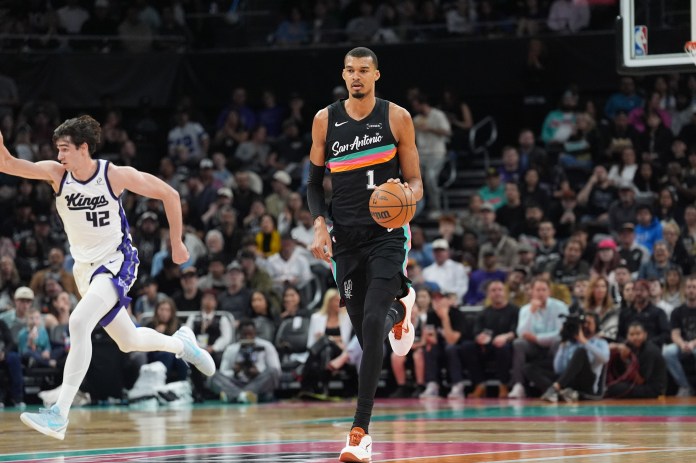 Spurs star Victor Wembanyama brings the ball up the floor during the 2025-26 NBA season.