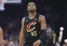 NBA Picks & Predictions Today (Feb. 24): Best Bets on Sides & Totals Cavaliers superstar Donovan Mitchell walks up the floor against the Thunder during the 2025-26 NBA season.