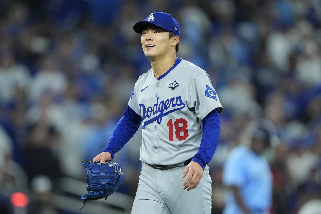 Dodgers pitcher Yoshinobu Yamamoto leaves the mound against the Blue Jays during the 2025 World Series.