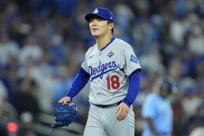 Dodgers pitcher Yoshinobu Yamamoto leaves the mound against the Blue Jays during the 2025 World Series.