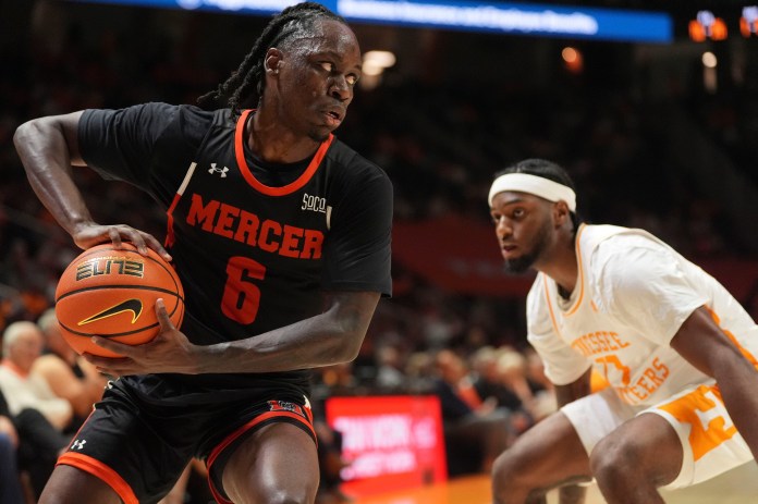 Mercer guard Baraka Okojie looks to make a play against Tennessee during the 2025-26 college basketball season.